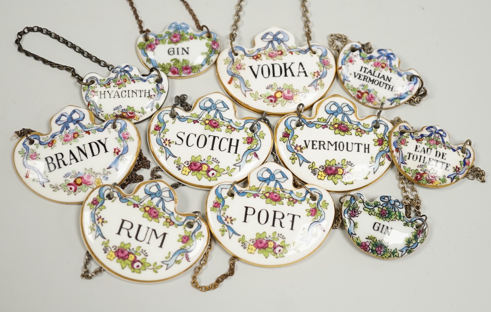 Sundry ceramic wine labels, Staffordshire and Coalport